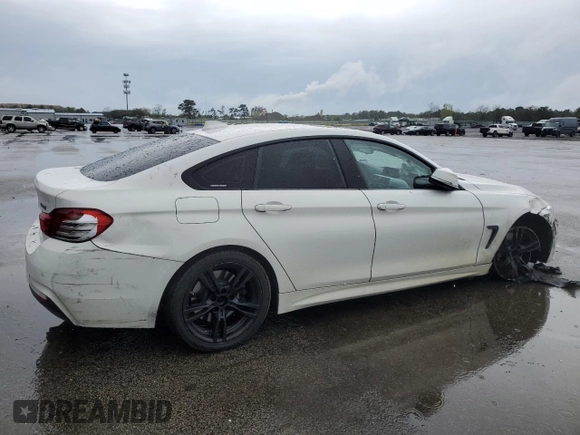 2016 BMW 4 Series 428i xDrive with VIN WBA4C9C58GG136718, listed as a Copart auction lot 55225815 with 169,356 mi miles and Salvage title. Bid and sale history available at DreamBid. Image 3.