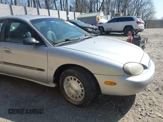 1999 Mercury Sable LS z VIN 1MEFM53S7XA622932, wystawiony jako IAAI lot #41708531 z przebiegiem 155 702 mil mil oraz . Historia ofert i sprzedaży dostępna na DreamBid. Obrazek 16.