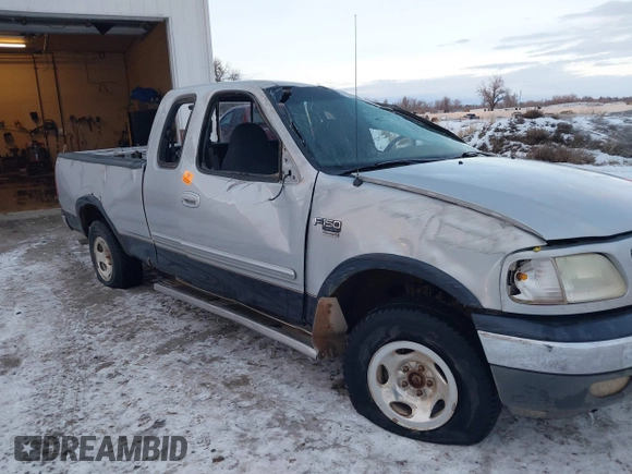 1999 Ford F-150 XL with VIN 1FTRX18LXXNA44916, listed as a IAAI auction lot 41322276 with 1 mi miles. Bid and sale history available at carsss.com. Image 16.