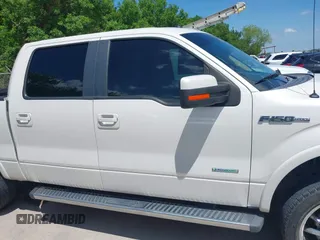2011 Ford F-150 XLT with VIN 1FTFW1CT7BFA59275, listed as a IAAI auction lot 42111709 with 203,718 mi miles. Bid and sale history available at carsss.com. Image 13.