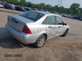 2007 Ford Focus S with VIN 1FAFP34NX7W265017, listed as a IAAI auction lot 42415556 with 71,840 mi miles and . Bid and sale history available at DreamBid. Image 4.