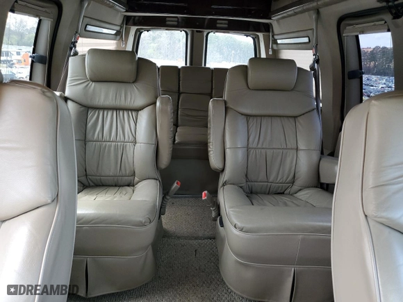2004 Chevrolet Express Passenger with VIN 1GBFG15TX41155433, listed as a Copart auction lot 48826455 with 327,969 mi miles and Salvage Title. Bid and sale history available at carsss.com. Image 10.
