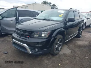 2015 Dodge Journey Crossroad with VIN 3C4PDCGG3FT599771, listed as a IAAI auction lot 41634296 with 76,547 mi miles and . Bid and sale history available at DreamBid. Image 2.