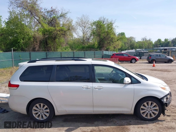 2014 Toyota Sienna Limited with VIN 5TDDK3DC0ES091826, listed as a IAAI auction lot 42112113 with 200,255 mi miles and . Bid and sale history available at DreamBid. Image 14.