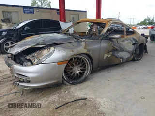 2004 Porsche 911 Carrera z VIN WP0AA29974S621731, wystawiony jako IAAI lot #40538243 z przebiegiem Nie podano mil oraz . Historia ofert i sprzedaży dostępna na DreamBid. Obrazek 2.