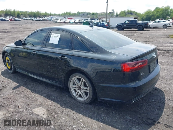 2016 Audi A6 Premium Plus with VIN WAUFGAFC7GN070599, listed as a IAAI auction lot 42460579 with 99,498 mi miles and . Bid and sale history available at DreamBid. Image 3.