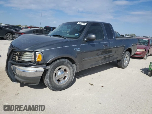 2003 Ford F-150 XL with VIN 1FTRX17L33NB34789, listed as a Copart auction lot 73762304 with 0 mi miles and Salvage Title. Bid and sale history available at carsss.com. Image 1.