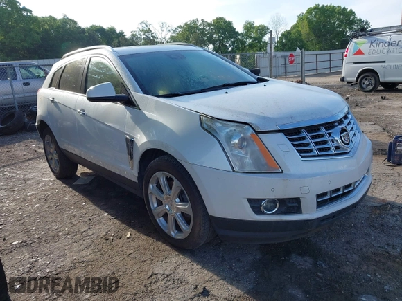 2014 Cadillac SRX Performance Collection with VIN 3GYFNCE36ES662689, listed as a IAAI auction lot 42109417 with 132,957 mi miles. Bid and sale history available at carsss.com. Image 1.