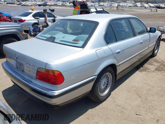 2000 BMW 7 Series 740iL with VIN WBAGH8341YDP14211, listed as a IAAI auction lot 42671152 with 247,472 mi miles and . Bid and sale history available at DreamBid. Image 4.