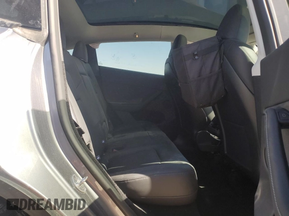 2024 Tesla Model Y Long Range with VIN 7SAYGDEE6RA321064, listed as a Copart auction lot 58889795 with 48,857 mi miles and Salvage title. Bid and sale history available at DreamBid. Image 10.