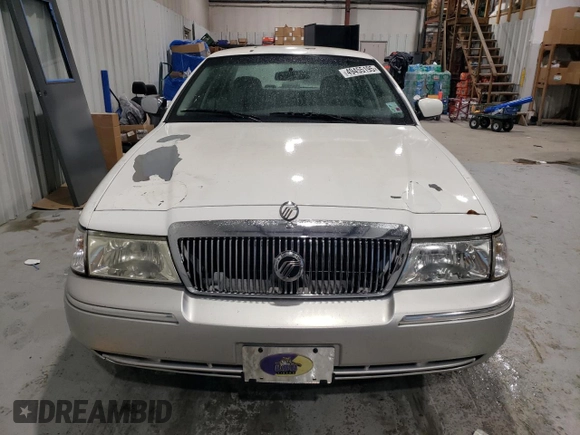 2005 Mercury Grand Marquis GS z VIN 2MEFM74W05X612471, wystawiony jako Copart lot #49455195 z przebiegiem 140 916 mil mil oraz Szkoda całkowita • Salvage title. Historia ofert i sprzedaży dostępna na DreamBid. Obrazek 5.