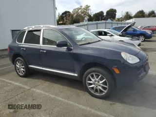 2006 Porsche Cayenne with VIN WP1AA29P06LA21255, listed as a Copart auction lot 70657014 with 112,367 mi miles and Salvage Title. Bid and sale history available at carsss.com. Image 4.