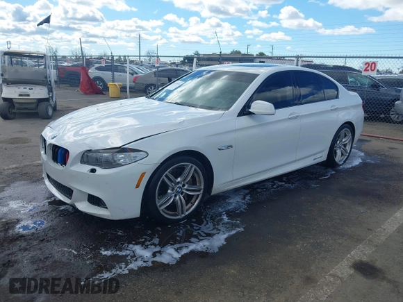 2013 BMW 5 Series 550i with VIN WBAFR9C55DDX79824, listed as a IAAI auction lot 41703036 with 107,166 mi miles and . Bid and sale history available at carsss.com. Image 2.