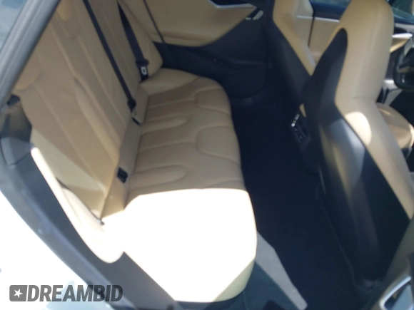 2013 Tesla Model S с VIN 5YJSA1AC8DFP10260, выставлен на аукционе IAAI как лот 42545156 с пробегом 121 329 миль миль и . История ставок и продаж доступна на DreamBid. Изображение 8.