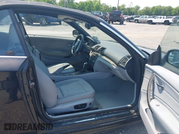 2010 BMW 1 Series 128i with VIN WBAUN1C55AVH81750, listed as a IAAI auction lot 42411484 with 124,432 mi miles and . Bid and sale history available at DreamBid. Image 5.