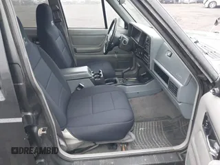1995 Jeep Cherokee Sport with VIN 1J4FJ68S7SL572730, listed as a IAAI auction lot 41474520 with 189,907 mi miles. Bid and sale history available at carsss.com. Image 5.