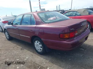 1996 Toyota Camry DX with VIN 4T1BG12K1TU785209, listed as a IAAI auction lot 41802026 with 223,452 mi miles. Bid and sale history available at carsss.com. Image 3.