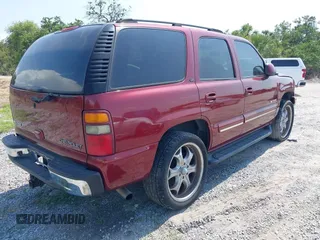 2003 Chevrolet Tahoe LT with VIN 1GNEC13Z93J234088, listed as a IAAI auction lot 42244167 with 183,070 mi miles and . Bid and sale history available at DreamBid. Image 4.