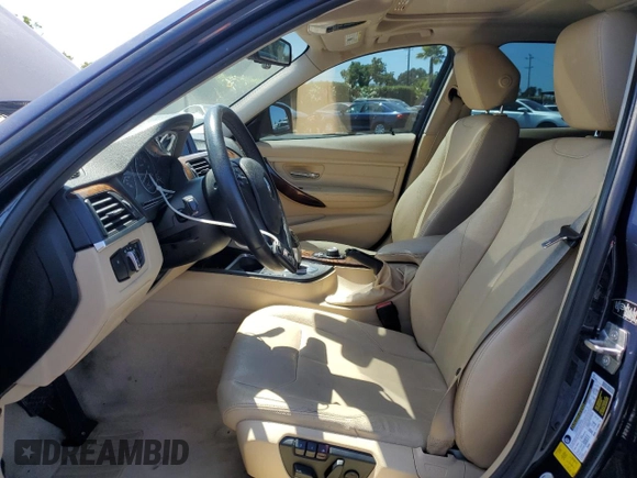 2013 BMW 3 Series 328i with VIN WBA3A5C52DF353760, listed as a Copart auction lot 62737045 with 129,354 mi miles and Salvage title. Bid and sale history available at DreamBid. Image 7.