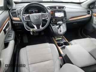 2020 Honda CR-V Touring z VIN 7FARW1H96LE006653, wystawiony jako Copart lot #57167475 z przebiegiem 49 286 mil mil oraz Szkoda całkowita • Salvage title. Historia ofert i sprzedaży dostępna na DreamBid. Obrazek 8.