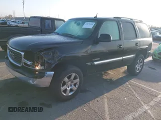 2005 GMC Yukon SLE with VIN 1GKEC13V15R105390, listed as a IAAI auction lot 42076410 with 237,160 mi miles. Bid and sale history available at carsss.com. Image 2.