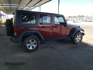 2010 Jeep Wrangler Unlimited Rubicon with VIN 1J4BA6H18AL197855, listed as a Copart auction lot 57748185 with 147,899 mi miles and Salvage title. Bid and sale history available at DreamBid. Image 3.