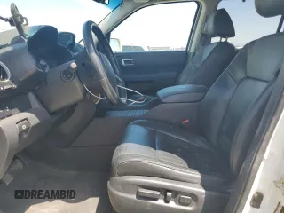 2014 Honda Pilot Touring z VIN 5FNYF4H9XEB047993, wystawiony jako Copart lot #57518705 z przebiegiem 159 809 mil mil oraz Szkoda całkowita • Salvage title. Historia ofert i sprzedaży dostępna na DreamBid. Obrazek 7.