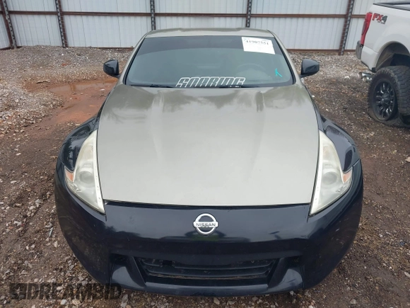 2009 Nissan 370Z Touring with VIN JN1AZ44E69M404341, listed as a IAAI auction lot 41907551 with 144,612 mi miles and . Bid and sale history available at DreamBid. Image 12.
