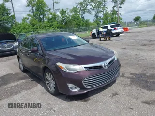 2014 Toyota Avalon Limited z VIN 4T1BK1EB5EU114879, wystawiony jako IAAI lot #42445782 z przebiegiem 168 761 mil mil oraz . Historia ofert i sprzedaży dostępna na DreamBid. Obrazek 1.