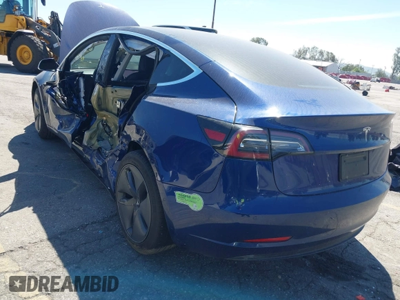 2020 Tesla Model 3 Standard Range Plus with VIN 5YJ3E1EA1LF590396, listed as a IAAI auction lot 41868089 with 51,278 mi miles. Bid and sale history available at carsss.com. Image 6.