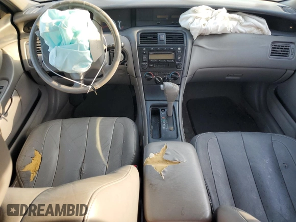 2001 Toyota Avalon XL z VIN 4T1BF28B61U175674, wystawiony jako Copart lot #49913765 z przebiegiem 170 245 mil mil oraz Tytuł czysty. Historia ofert i sprzedaży dostępna na DreamBid. Obrazek 8.