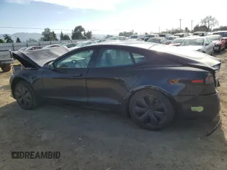 2023 Tesla Model S with VIN 5YJSA1E57PF507456, listed as a Copart auction lot 44649945 with 8,760 mi miles and Salvage title. Bid and sale history available at DreamBid. Image 2.