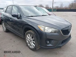 2015 Mazda CX-5 Grand Touring with VIN JM3KE4DY0F0479229, listed as a IAAI auction lot 41838381 with 139,843 mi miles. Bid and sale history available at carsss.com. Image 1.