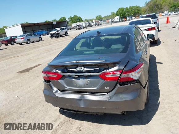 2019 Toyota Camry LE with VIN 4T1B11HK8KU289721, listed as a IAAI auction lot 42021107 with 69,828 mi miles and . Bid and sale history available at DreamBid. Image 16.