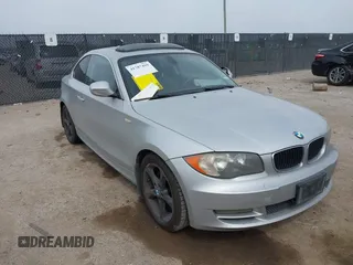2011 BMW 1 Series 128i with VIN WBAUP7C53BVK78939, listed as a IAAI auction lot 41787499 with 169,434 mi miles. Bid and sale history available at carsss.com. Image 1.