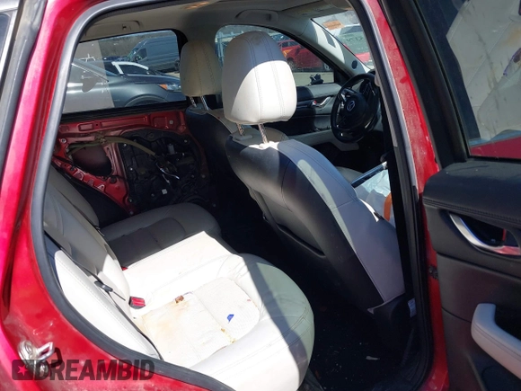 2020 Mazda CX-5 Grand Touring with VIN JM3KFADM3L0761286, listed as a IAAI auction lot 41715379 with 145,656 mi miles and . Bid and sale history available at DreamBid. Image 8.
