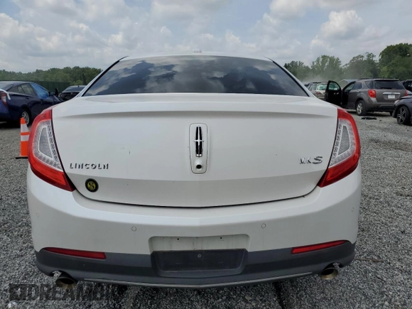 2013 Lincoln MKS with VIN 1LNHL9DK4DG612981, listed as a Copart auction lot 60701895 with 113,354 mi miles and Salvage title. Bid and sale history available at DreamBid. Image 6.