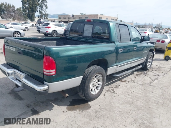 2001 Dodge Dakota Sport with VIN 1B7HL2AN81S281275, listed as a IAAI auction lot 41693105 with 276,182 mi miles. Bid and sale history available at carsss.com. Image 4.