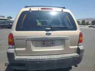 2007 Ford Escape XLS с VIN 1FMYU02Z17KA20500, выставлен на аукционе Copart как лот 59016055 с пробегом 215 936 миль миль и Списание • Salvage title. История ставок и продаж доступна на DreamBid. Изображение 6.