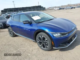 2022 Kia EV6 Wind z VIN KNDC3DLCXN5068642, wystawiony jako IAAI lot #41774075 z przebiegiem 17 632 mil mil oraz . Historia ofert i sprzedaży dostępna na DreamBid. Obrazek 1.