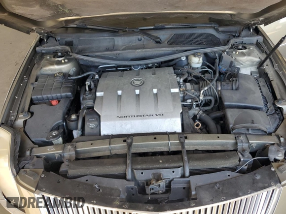 2010 Cadillac DTS 1SC z VIN 1G6KD5EYXAU119017, wystawiony jako Copart lot #56149775 z przebiegiem 113 617 mil mil oraz Szkoda całkowita • Salvage title. Historia ofert i sprzedaży dostępna na DreamBid. Obrazek 11.