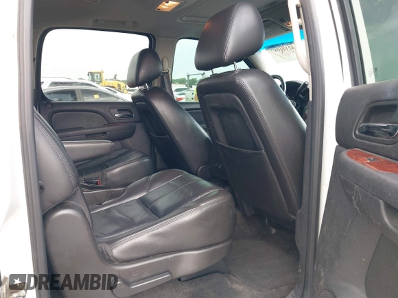 2011 Chevrolet Suburban LT with VIN 1GNSCJE05BR392834, listed as a IAAI auction lot 42141087 with 251,359 mi miles and . Bid and sale history available at DreamBid. Image 8.