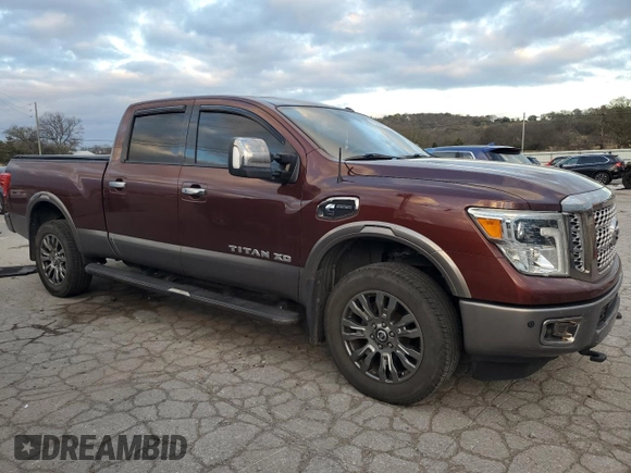 2017 Nissan Titan XD SV with VIN 1N6BA1F46HN522679, listed as a Copart auction lot 79296794 with 140,454 mi miles and Salvage Title. Bid and sale history available at carsss.com. Image 4.
