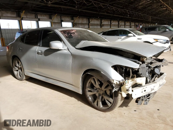 2011 Infiniti M with VIN JN1BY1APXBM324638, listed as a Copart auction lot 51014985 with 194,447 mi miles and Salvage title. Bid and sale history available at DreamBid. Image 4.