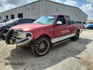 2000 Ford F-150 XL z VIN 1FTZX1721YNA09515, wystawiony jako Copart lot #63215735 z przebiegiem 188 149 mil mil oraz Szkoda całkowita • Salvage title. Historia ofert i sprzedaży dostępna na DreamBid. Obrazek 1.