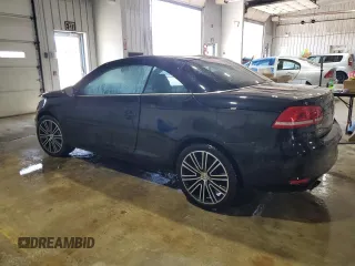 2014 Volkswagen Eos Komfort with VIN WVWBW8AH8EV000316, listed as a Copart auction lot 52208485 with 124,338 mi miles and Salvage Title. Bid and sale history available at DreamBid. Image 2.