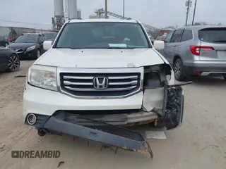 2013 Honda Pilot Touring with VIN 5FNYF3H98DB025516, listed as a IAAI auction lot 41767097 with 202,908 mi miles and . Bid and sale history available at DreamBid. Image 12.