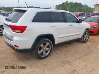 2013 Jeep Grand Cherokee Overland with VIN 1C4RJECGXDC621227, listed as a IAAI auction lot 42098042 with 194,232 mi miles and . Bid and sale history available at DreamBid. Image 4.