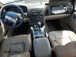 1999 Jeep Grand Cherokee Laredo с VIN 1J4GW58S5XC612309, выставлен на аукционе Copart как лот 56705085 с пробегом 200 004 миль миль и Списание • Salvage title. История ставок и продаж доступна на DreamBid. Изображение 8.