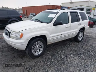 2002 Jeep Grand Cherokee Limited with VIN 1J8GX58N42C283956, listed as a IAAI auction lot 41553997 with 214,388 mi miles and . Bid and sale history available at DreamBid. Image 2.